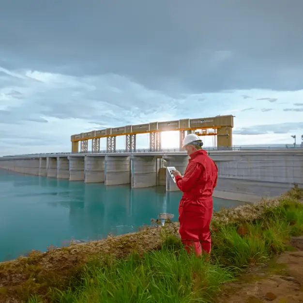 Engineer looking at a dam