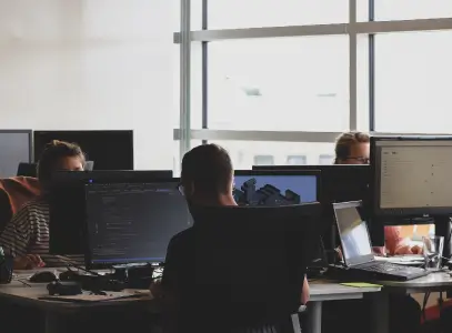 office of people working on a laptop