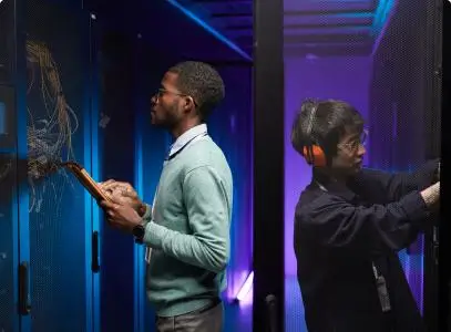 two men woring in a server room