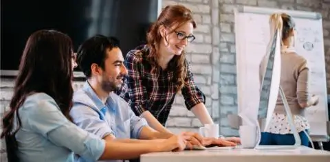 people working together at a desk