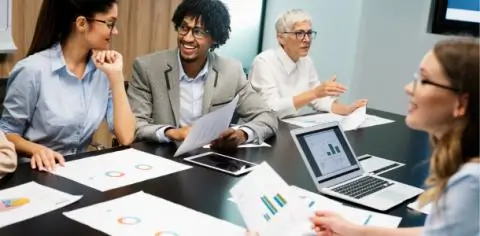 people working together in a boardroom