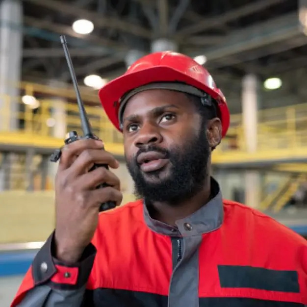 Man speaking over a radio