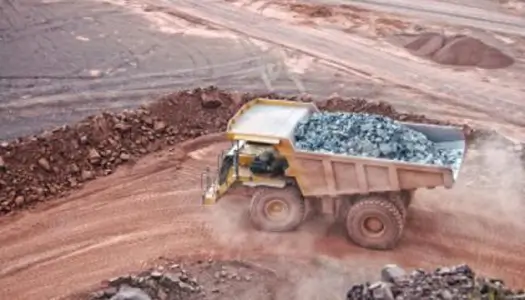 Truck with load on mining site