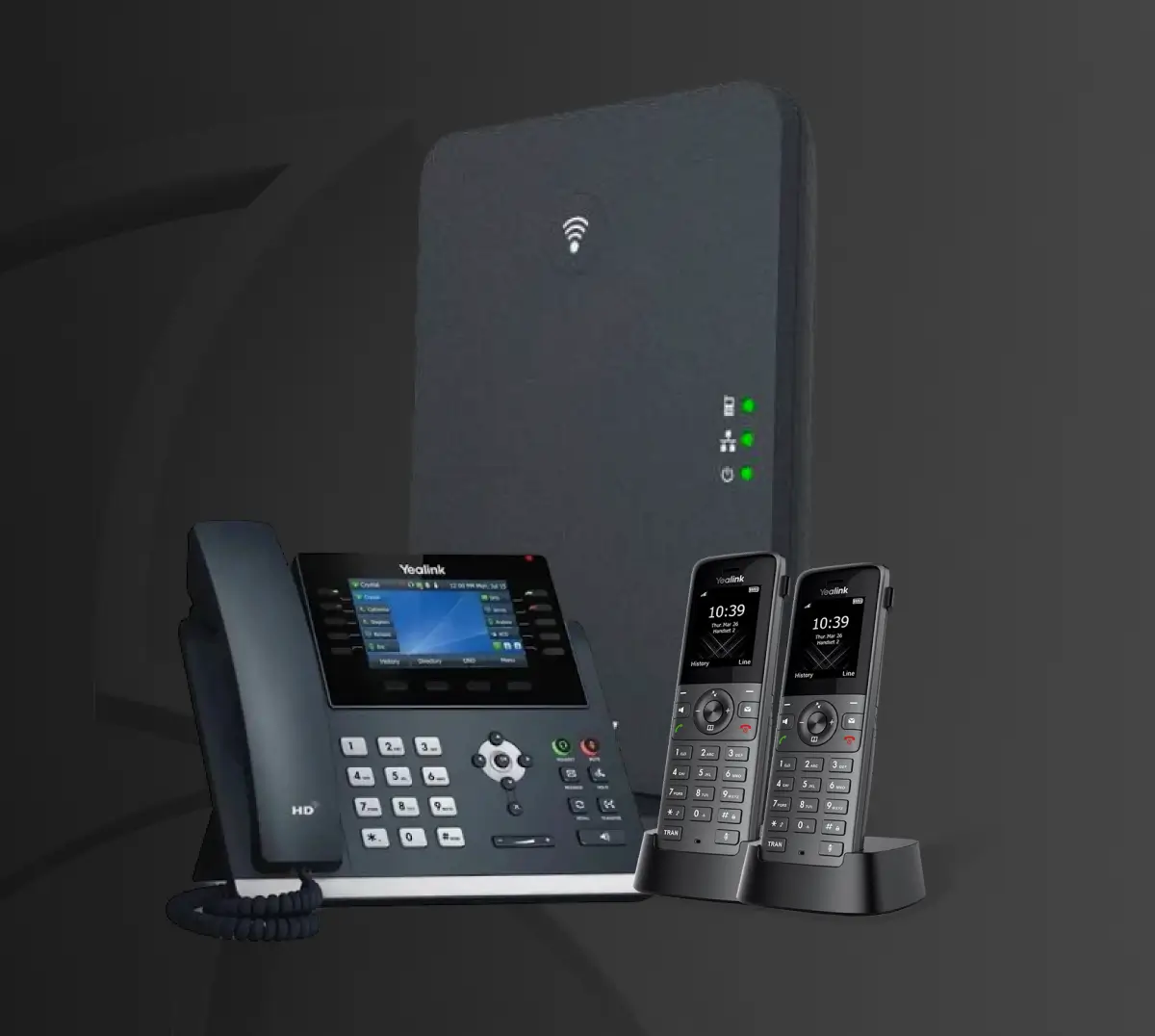 product ensemble of Yealink VoIP telecommunication equipment set against a dark grey background. The setup includes a large desktop IP phone with a color display, two cordless DECT handsets on their charging cradles, and a sleek, upright wireless base station router with green LED status lights.